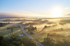 Dronefoto over Rød- Sommer tåke